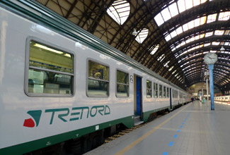 Italian regional train from Milan to Tirano about to leave Milan Centrale, to connect with the Bernina Express