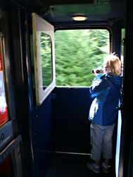 Taking photos from the vestibule of a Red Leaf car.