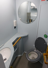 Toilets are at the end of the corridor