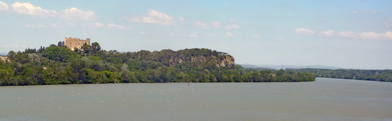 Crossing the Rhone with views of the Chateau de Montfaucon