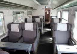 A first class compartment on an Italian InterCity train.