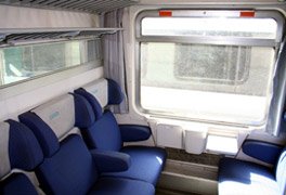 A second class compartment on an Italian InterCity train.
