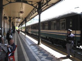 A sleeper train to Sicily at a wayside Italian station