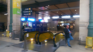 Escalators to left luggage at Paris Nord