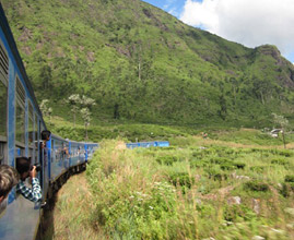 One of the new Chinese-built blue trains on the way to Kandy
