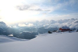 The Muottas Muragl Berghotel & view over St Moritz valley