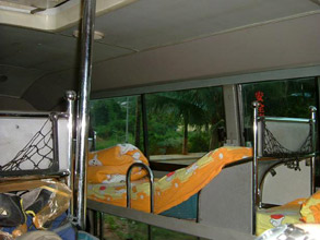 Inside the Kunming sleeper bus:  Berths are a bit short for taller travellers...