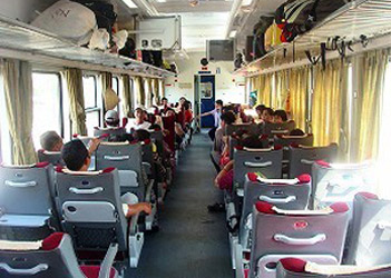 Air-conditioned soft class reclining seats on an SE train, Hanoi-Saigon