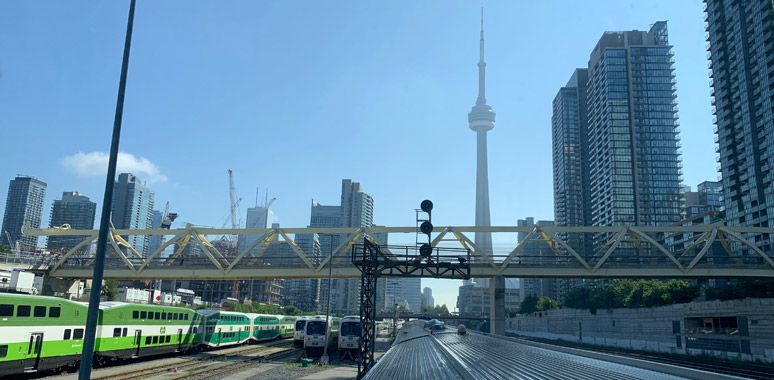 Looking back at the CN Tower as the train to Vancouver leaves Toronto