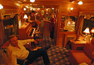 Evening fun in the Eastern & Oriental Express's piano bar car.