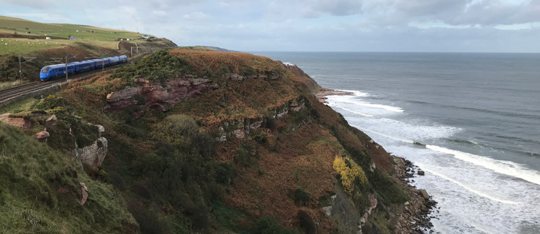 The train runs along the coast