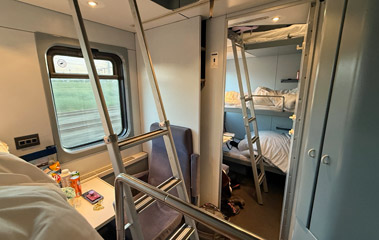 Two adjacent sleepers with connecting door opened