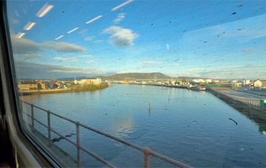 The Far North Line train crosses the river Ness